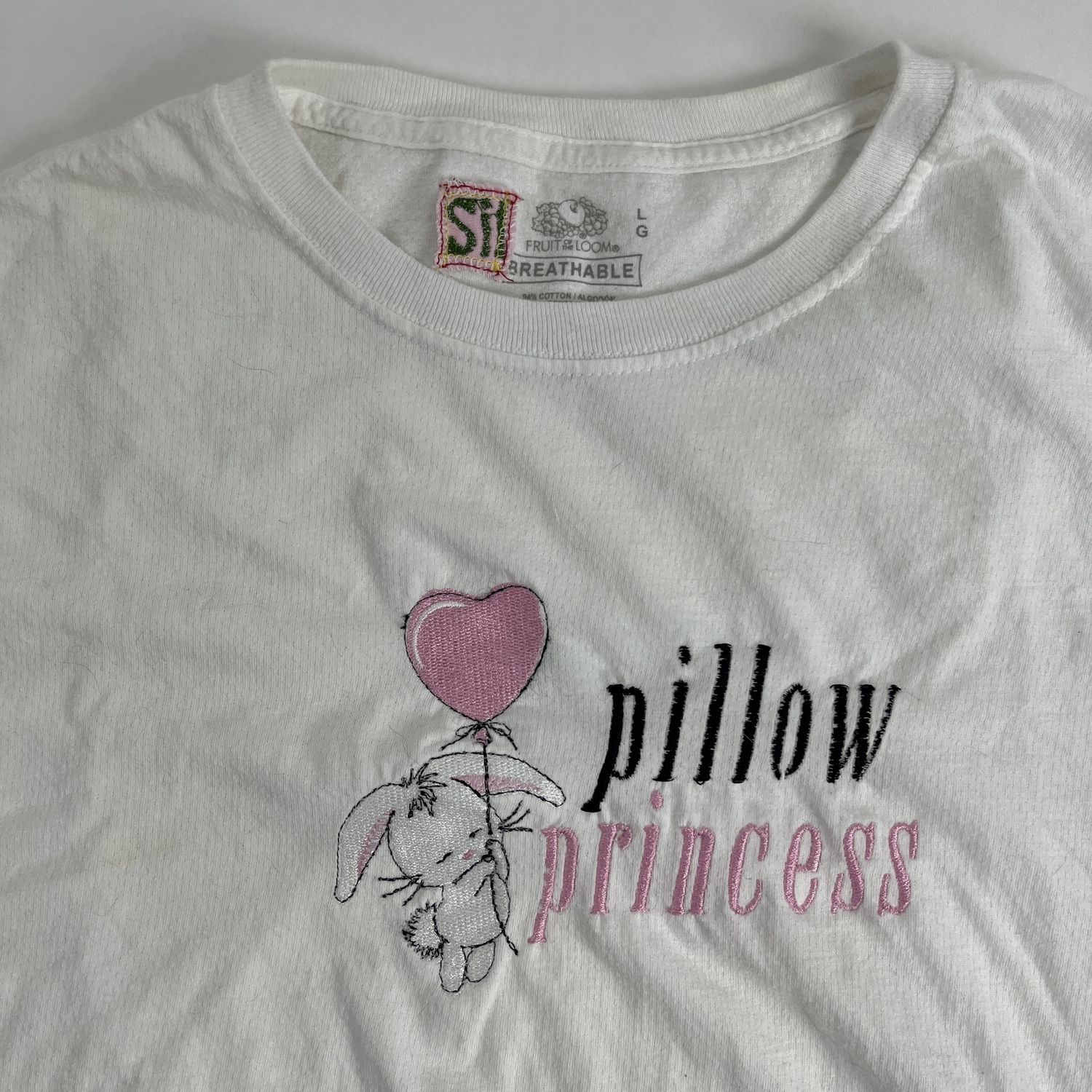white pillow tee