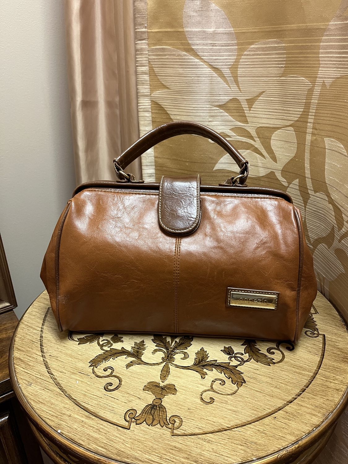 brown brief case bag