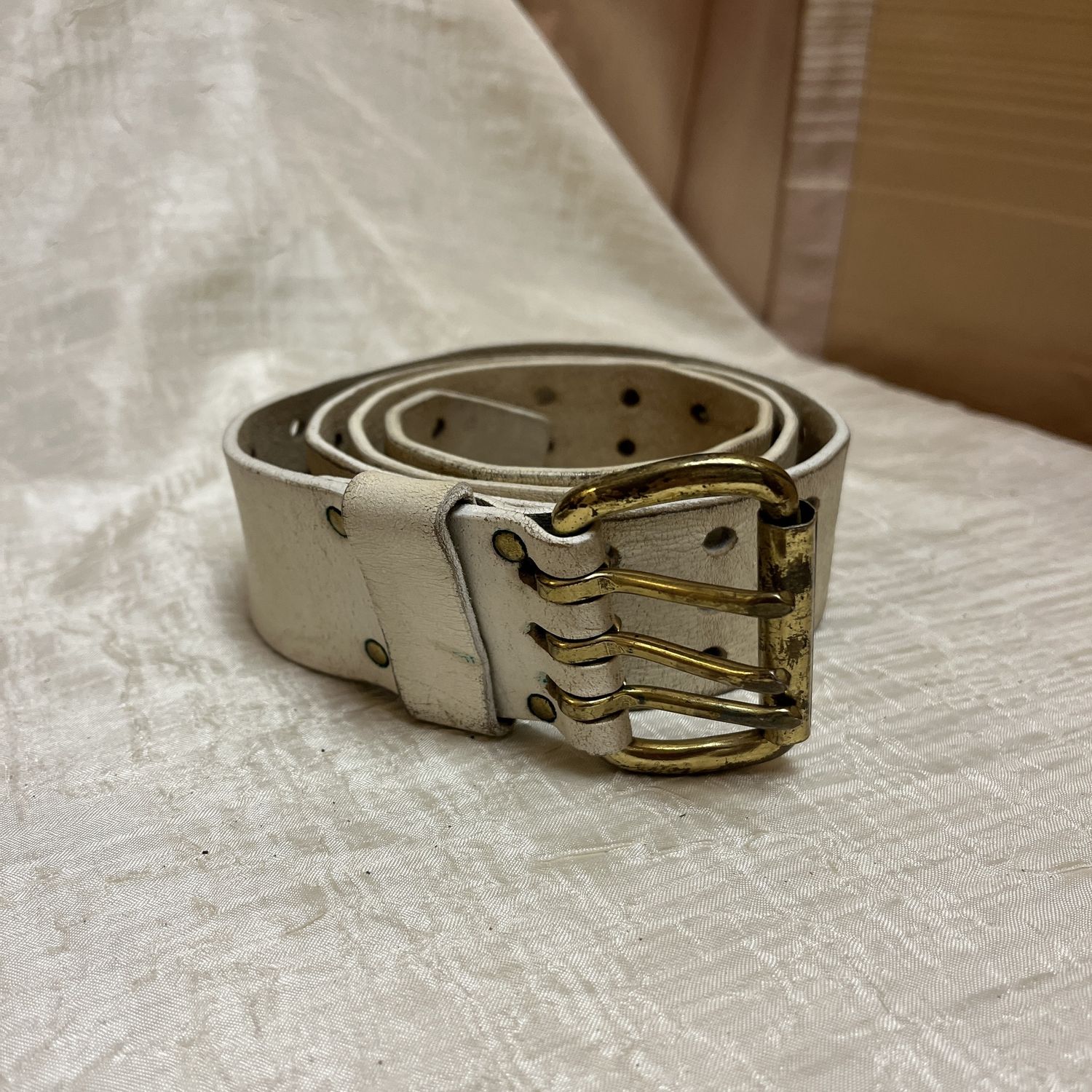 three hole punch cream belt
