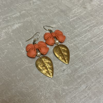 Gold bow leaf earrings