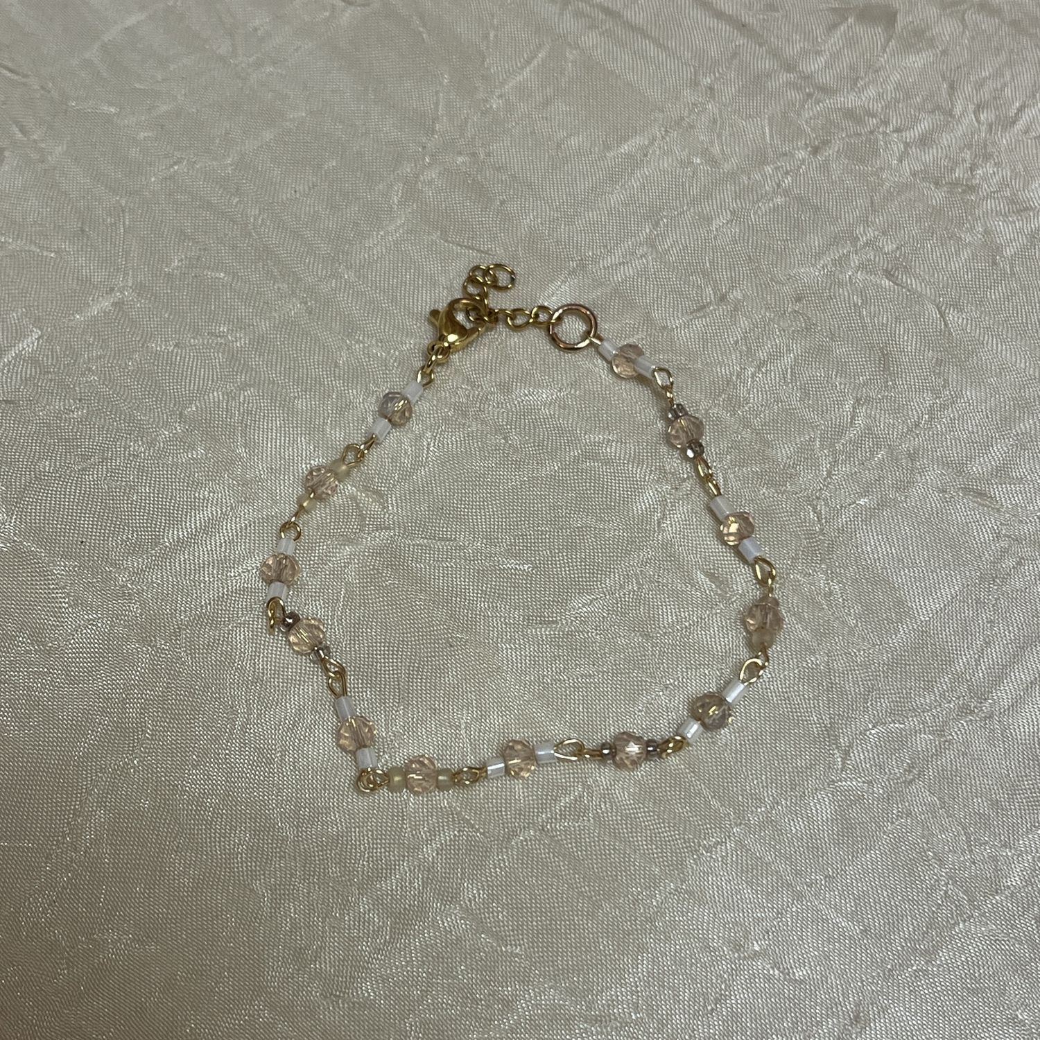 pink and white bracelet