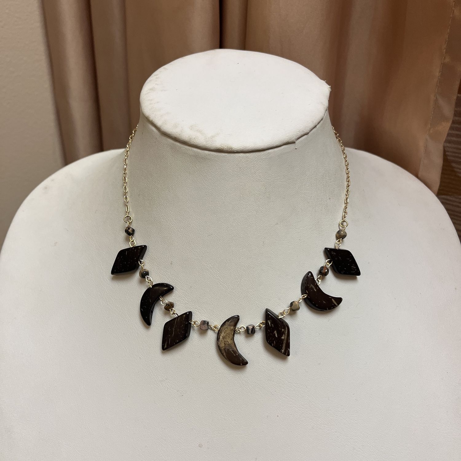 brown and gold necklace