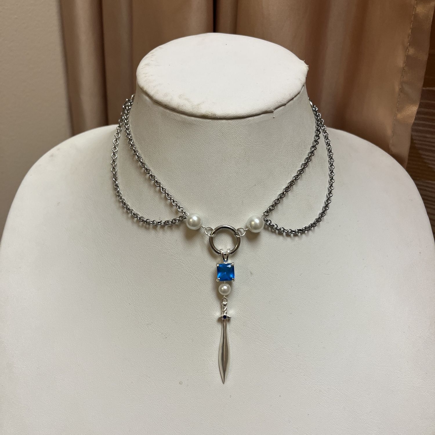 blue pearl sword necklace