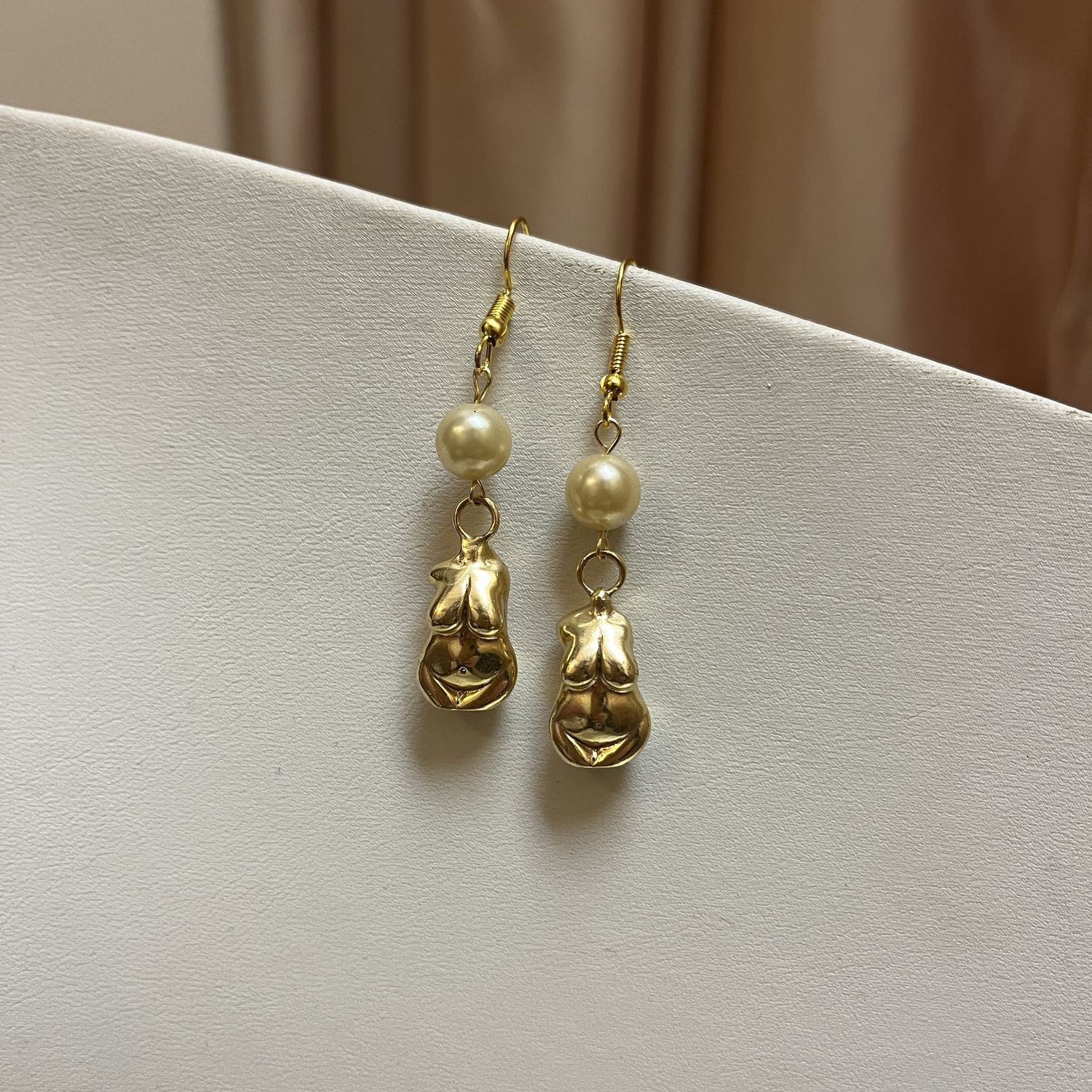 pearl boob earrings
