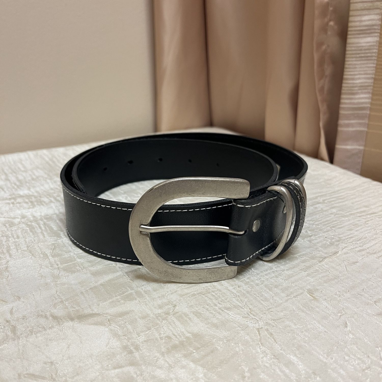 Black belt silver buckle