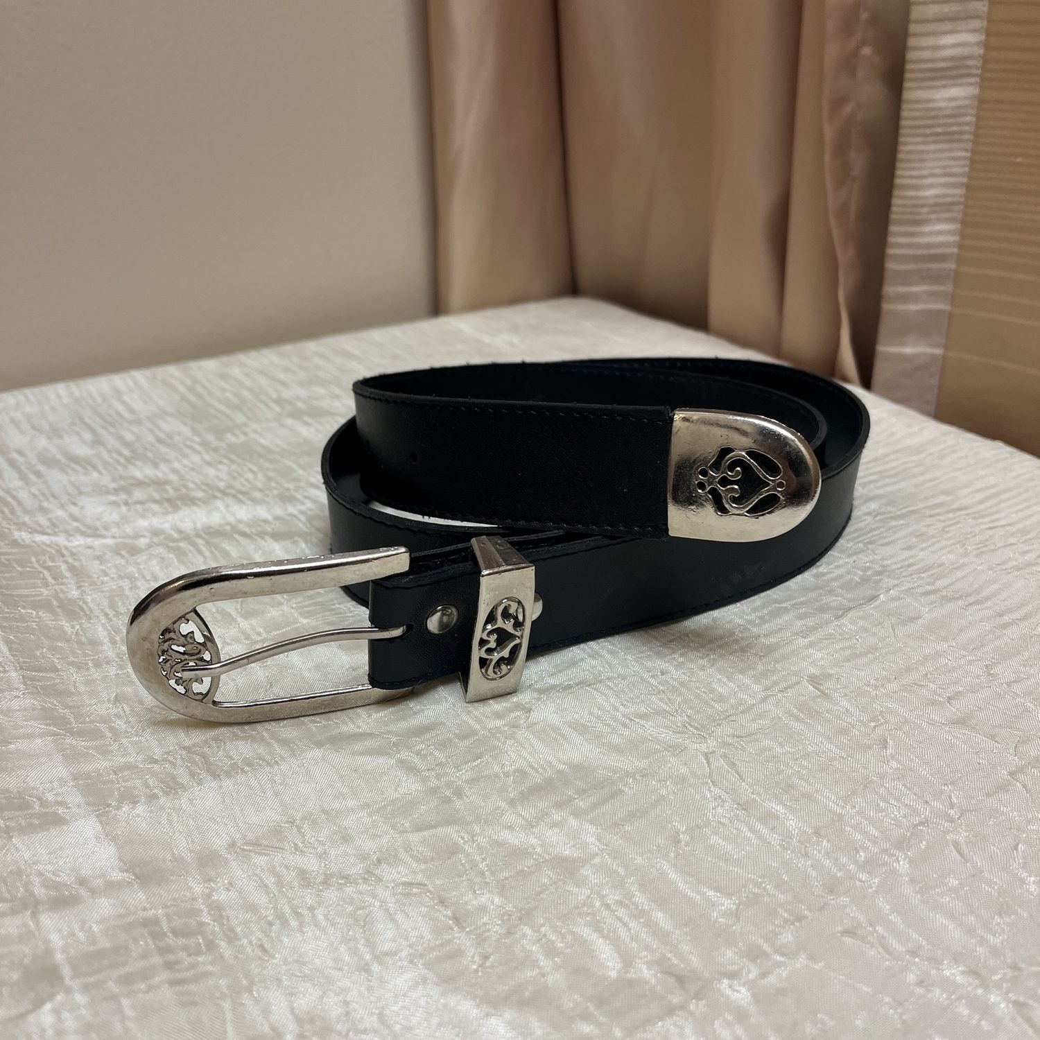 detailed silver bucked belt