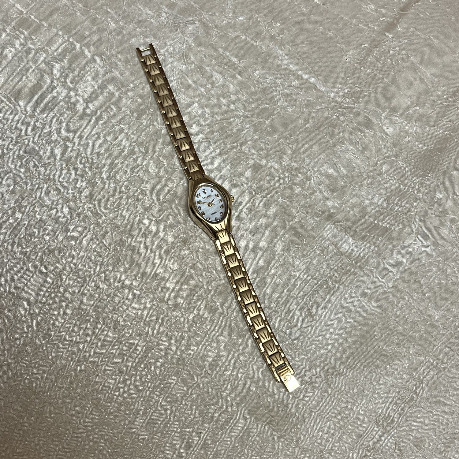 Gold Oval Dial Analog Watch