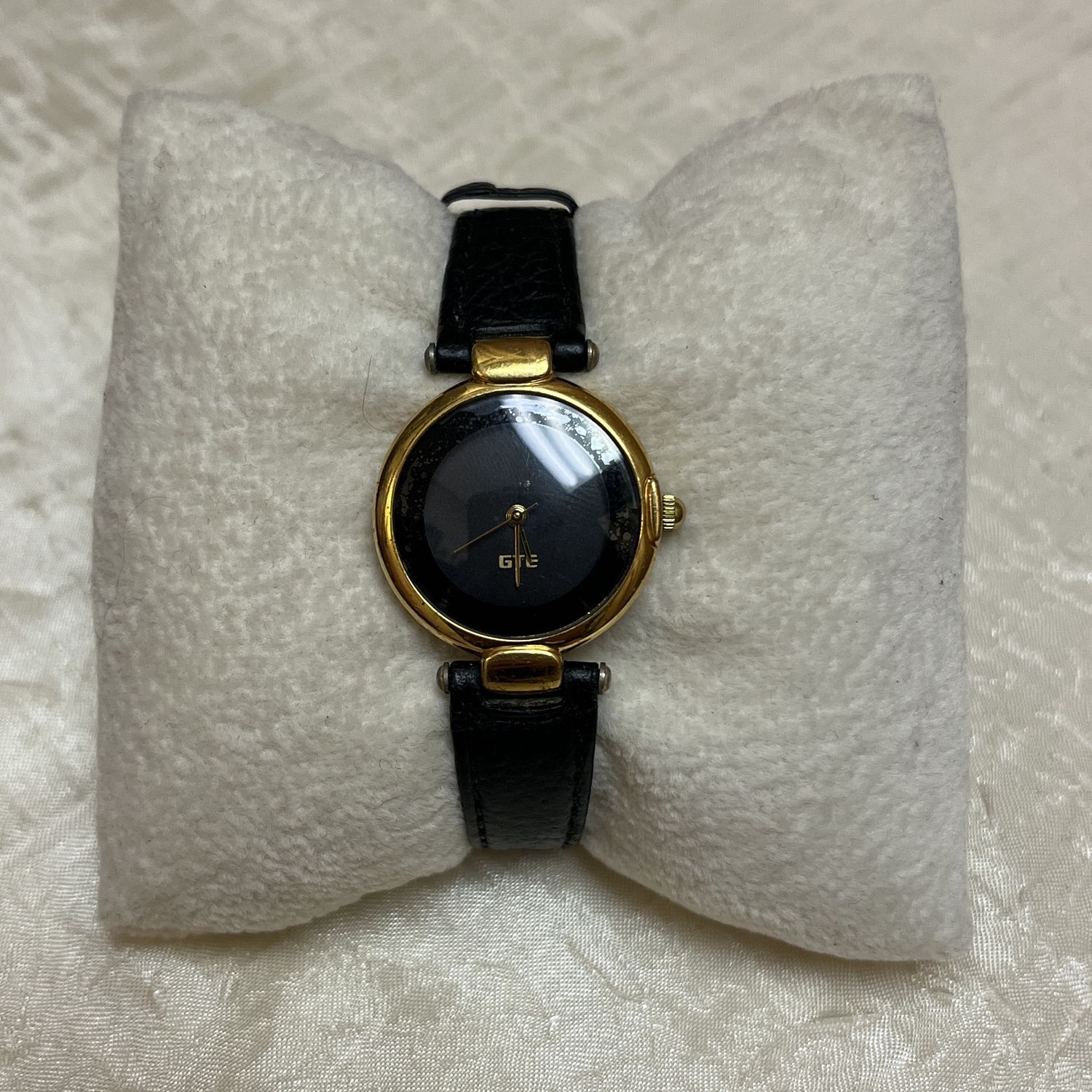 Gold Rimmed Face Black Watch