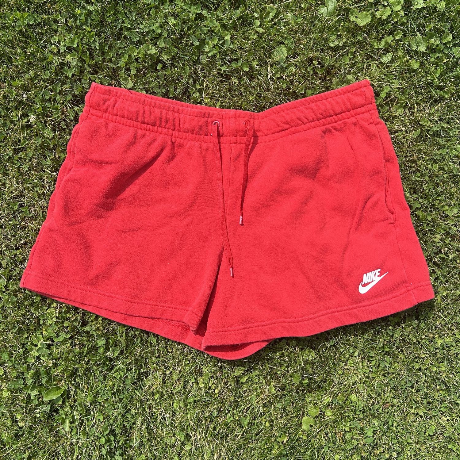 red nike shorts