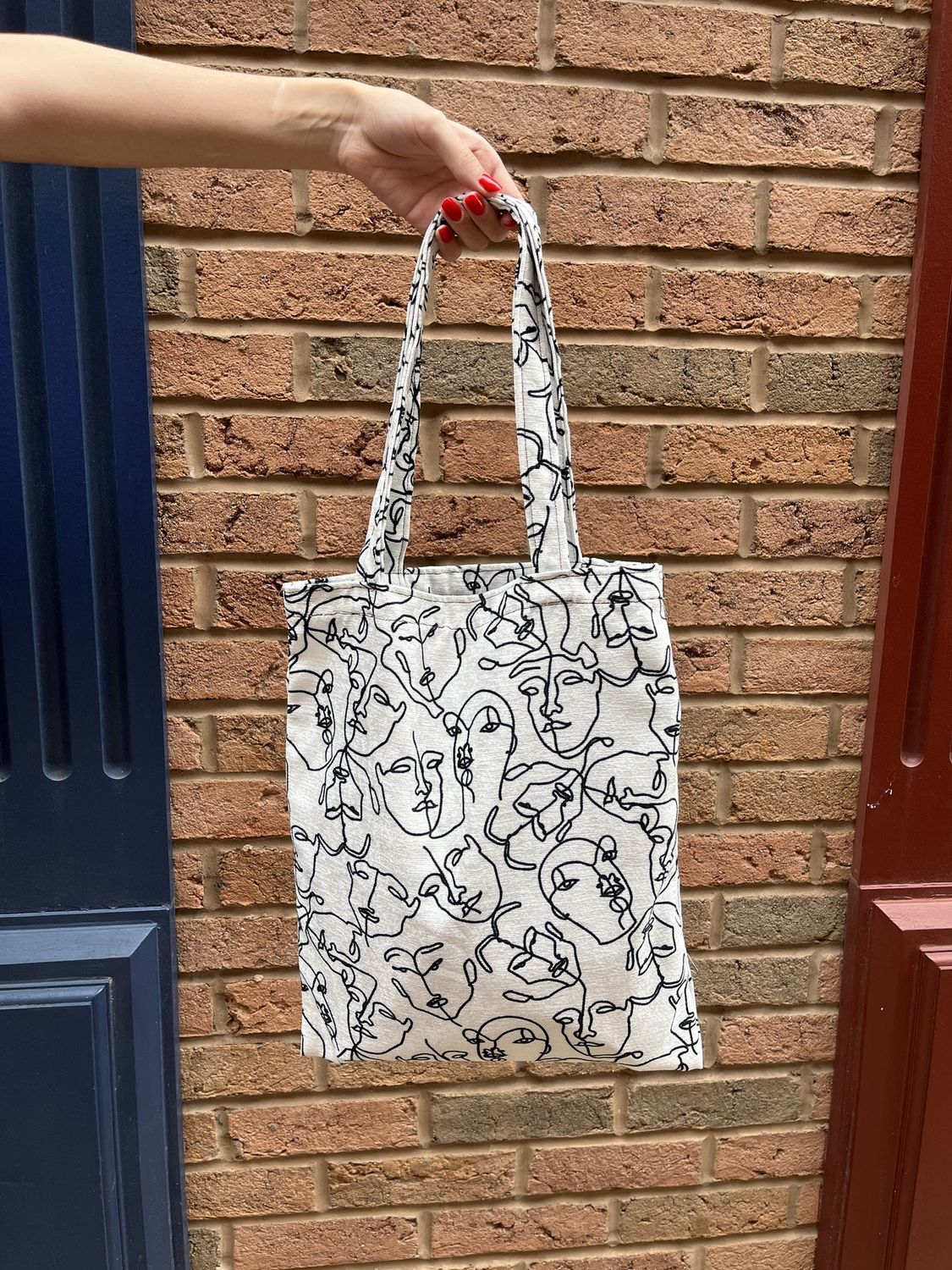 Faces Tote Bag