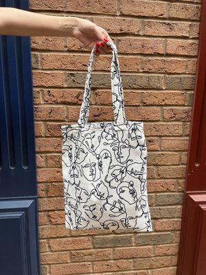 Faces Tote Bag