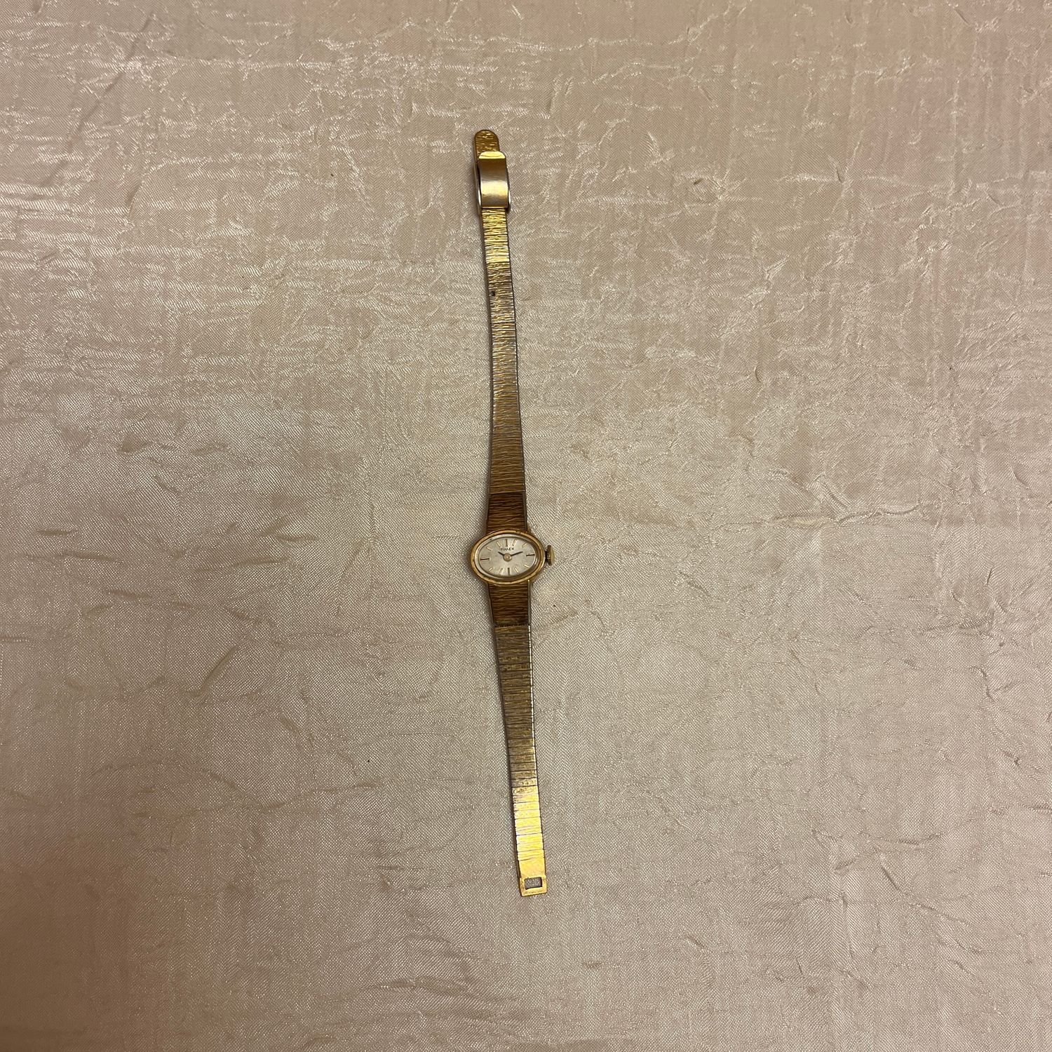 Gold Oval Watch