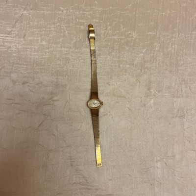 Gold Oval Watch