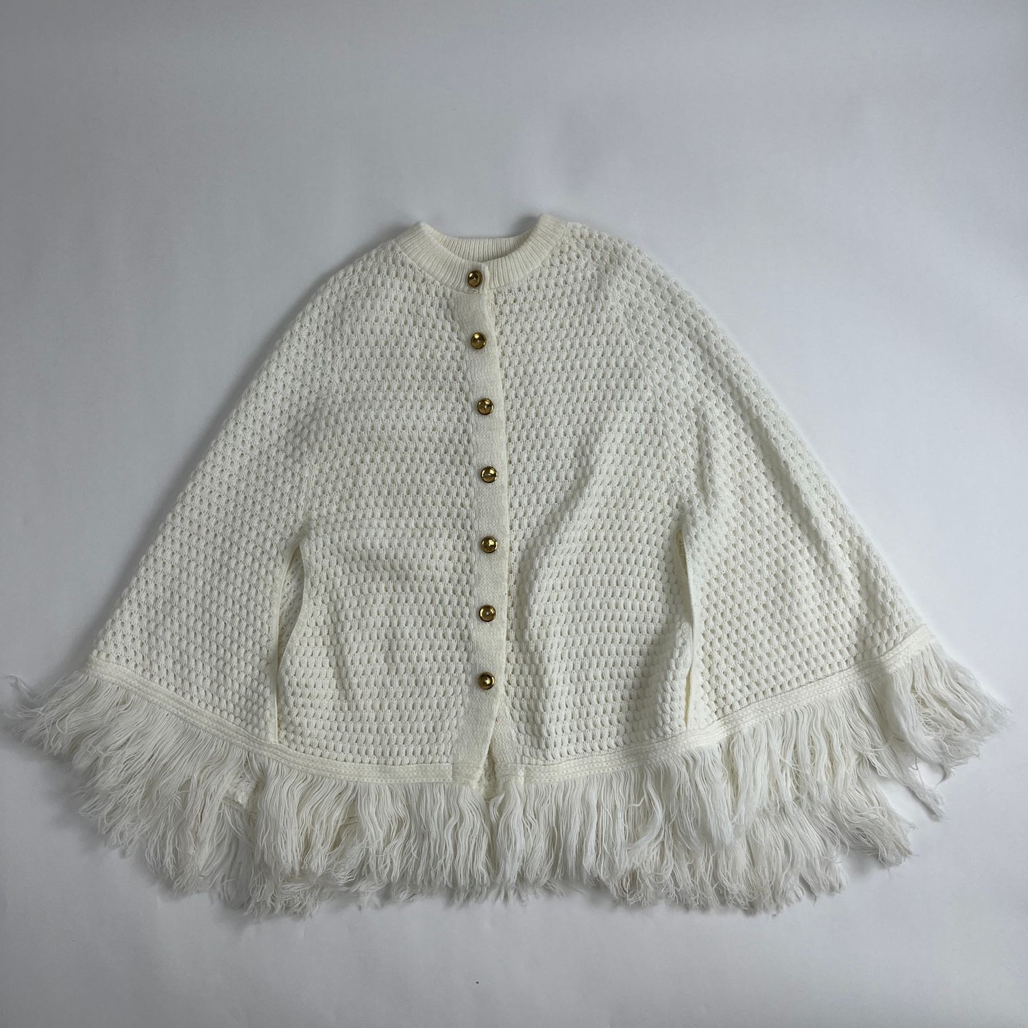 cream knit poncho
