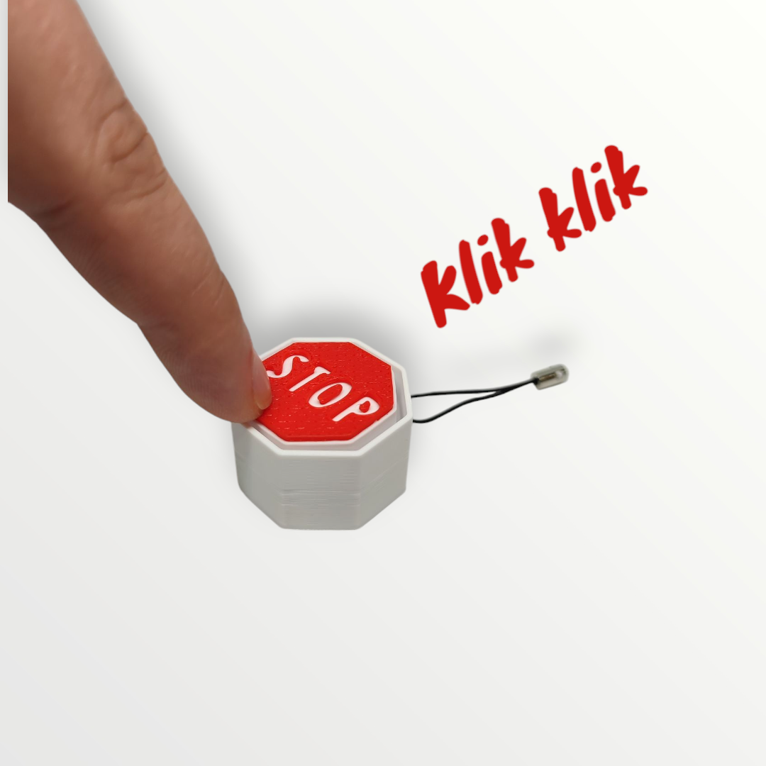 fidget kliker clicker znak stop szkolne gadżety keyswitch brelok antystresowy antystresowe breloki