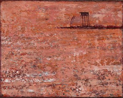 Lonely old bore water station in a stark, terra-cotta colored, dry desert in Australia&#39;s Red Centre.