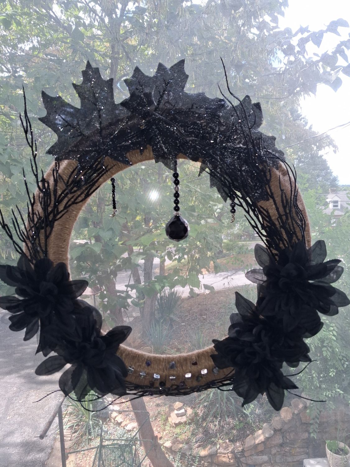 Black and Silver Suncatcher Wreath with Crystals and Healing Stones to Honor Hecate, The Ancient Greek Goddess of Magic, Witchcraft, and the Crossroads