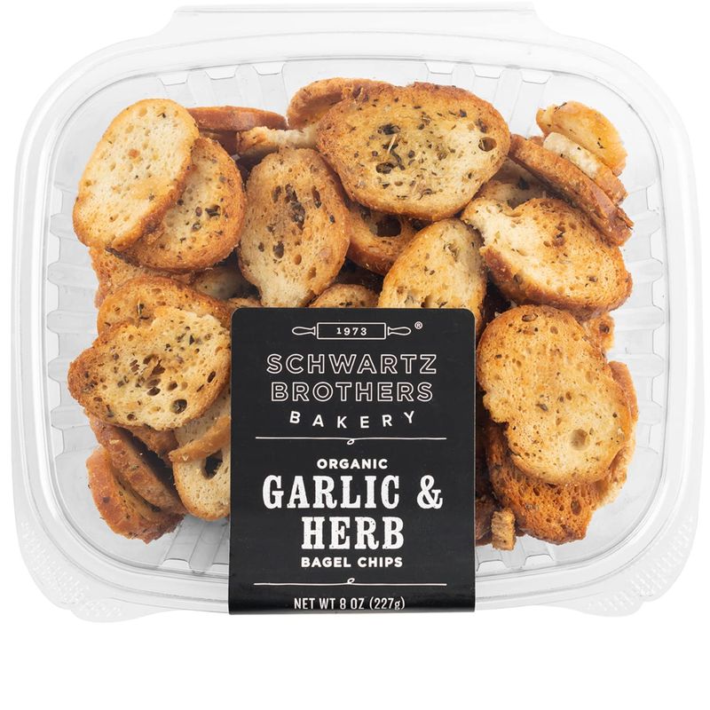 Garlic &amp; Herb Bagel Chips NY Style Bagel Crisps. Organic, Vegan, Kosher. From the artisans of Schwartz Brothers Bakery. Baked Fresh. Twice Baked. 8 ounce container. Great Snack. Delicious. Pack of 2.