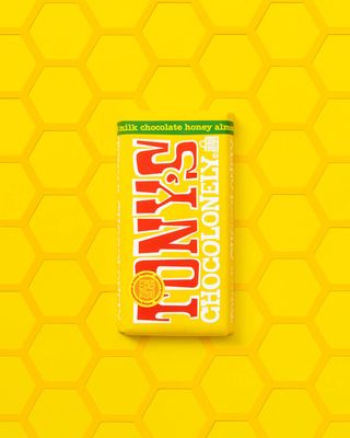 Tony's Chocolonely 32% Milk Chocolate Bar with Honey Almond Nougat - Belgium Chocolate, No Artificial Flavoring, Fairtrade &amp; B Corp Certified - 6.35 Oz