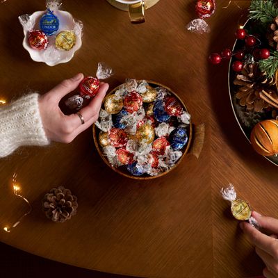 Lindt LINDOR Assorted Chocolate Truffles 90 Count Gift Box, Chocolate Candy with Smooth, Melting Truffle Center, 38.4 oz. Box