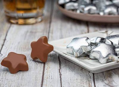 Madelaine Solid Premium Milk Chocolate Stars, Wrapped In Italian Foil (Silver, 1/2 LB)