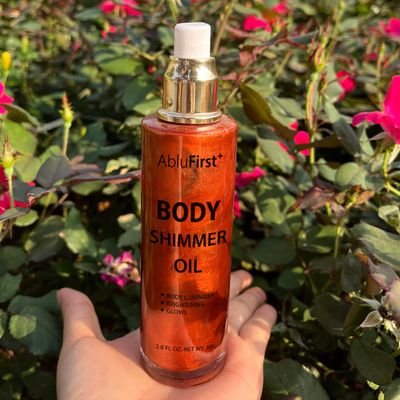 AbluFirst Shimmer Body Oil 4 Colors Face Glitter Summer Body Makeup Moisturizing Light Shimmering Glow Non-Sticky Party Luminizer and Illuminator Smooth (2.8 Fl Oz Pack of 1, Golden Brown)