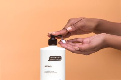 AHAVA Dead Sea Water Mineral Body Lotion - Daily Moisturizing & Hydrating Body Lotion with Osmoter, Exclusive blend of Dead Sea Minerals & Botanical Extracts, Original, 24 Fl.Oz (Packaging May Vary)