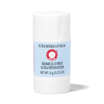 First Aid Beauty - Ultra Repair Lip Balm, Instant Hydration and Moisture for Soft, Supple &amp; Plump Lips, Concentrated Formula of Botanical Oils, Butters &amp; Waxes, Cruelty Free, 0.25 oz