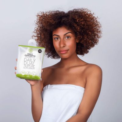 Daily Dual Texture Scrubber - Daily Concepts - Regular texture where you need more exfoliation and soft texture for the more gentle parts of your body