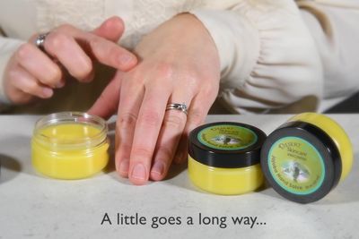 Jojoba Oil Hand Salve. Over 50% Pure Organic Jojoba Oil. Moisturizes Hair, skin, face, hands, feet naturally. Softening formula with Organic Beeswax and Organic Avocado Oil.(2 oz/60gm)