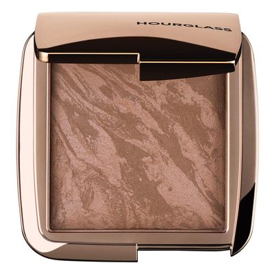 Hourglass Ambient Lighting Bronzer in Luminous Bronze Light. Highlighting Bronzer for a Natural Sun-Kissed Glow. Vegan and Cruelty-Free.