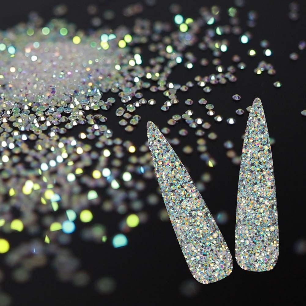 10000Pcs Tiny Nail Rhinestones 1.2mm Clear AB Flatback Glass Pixie Crystals, Iridescent Nail Gems Long Lasting Shine Small Sugar Glitter Beads Dust Nail Charms for Nail Design DIY Crafts Accessories