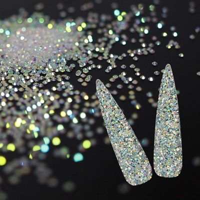 10000Pcs Tiny Nail Rhinestones 1.2mm Clear AB Flatback Glass Pixie Crystals, Iridescent Nail Gems Long Lasting Shine Small Sugar Glitter Beads Dust Nail Charms for Nail Design DIY Crafts Accessories
