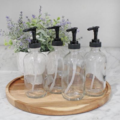 Cornucopia Brands 8oz Clear Glass Pump Bottles (4-Pack w/Black Plastic Pumps), Great as Essential Oil Bottles, Lotion Bottles, Soap Dispensers, and More
