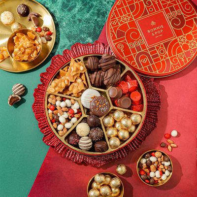 BONNIE AND POP - Holiday Snack Gift Tin, Round, Modern Pattern, Assorted Treats: Belgian Truffles, Chocolate Covered Oreos, Peanut Brittle and Candy Nuts