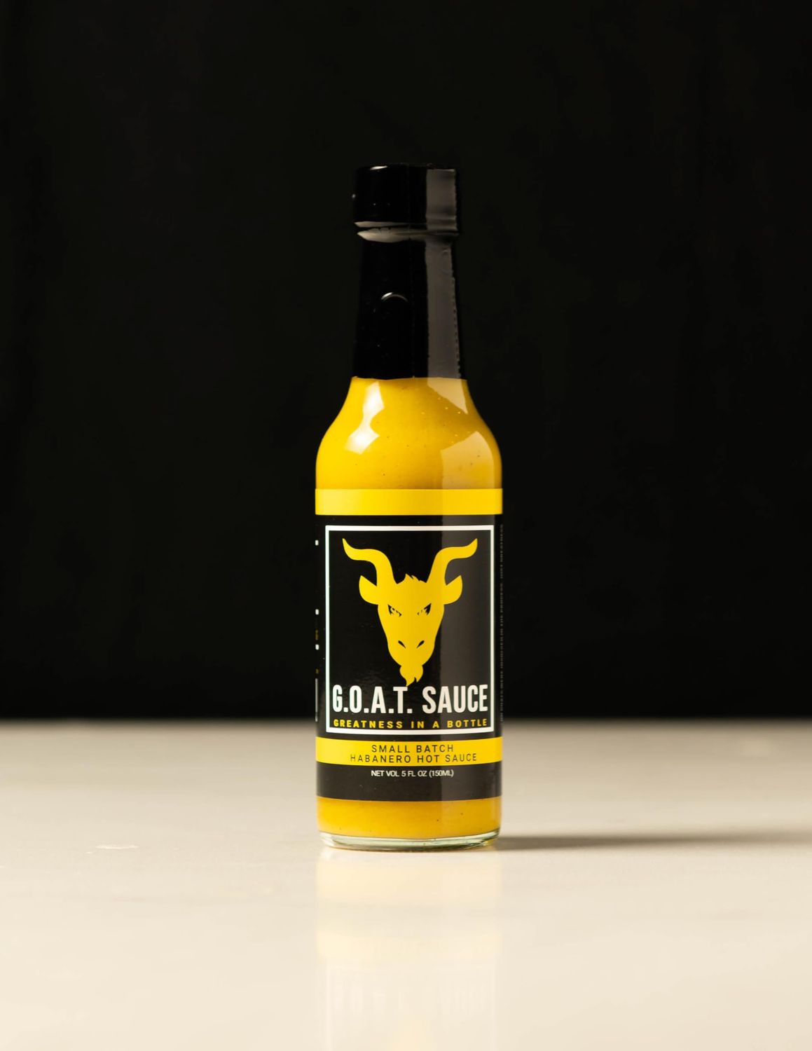 The GOAT Hot Sauce, 5 fl oz, Mild Heat with a Hint of Sweetness, Made from Fresh Ingredients: Habanero Peppers, Onions, Carrots, Jalapenos and Garlic. No Goats. Put Greatness On Everything!