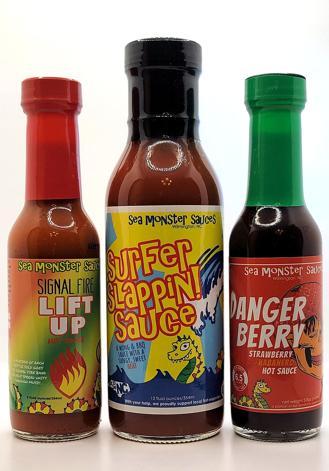 Sea Monster Sauces Sampler - 1 Bottle Surfer Slappin! Sauce - 1 Bottle Danger Berry - 1 Bottle Lift Up Hot Sauce