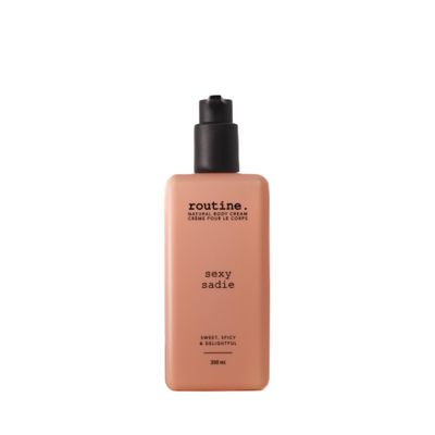 Routine Sexy Sadie 350ml Natural Body Cream. Ylang Ylang, Sweet Orange, Vanilla Cinnamon. Botanicals No Synthetic Fragrance Vegan Clinically Tested Hands Body Signature Scent