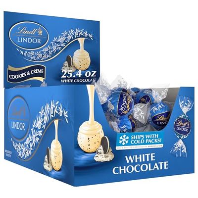 Lindt LINDOR Cookies and Creme White Chocolate Candy Truffles, Easter Chocolate Candy with Smooth, Melting Truffle Center, 25.4 oz., 60 Count