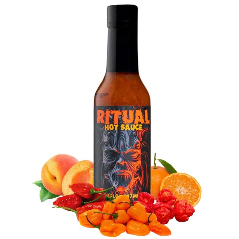 HELLFIRE RITUAL CARIBBEAN SPICED RUM-INFUSED HOT SAUCE. A TASTE OF THE ISLANDS TRINIDAD SCORPION, 7-POT PRIMO &amp; ORANGE HABANERO PEPPERS BRING AN ERUPTION OF HEAT! MANGOES, PAPAYAS, PINEAPPLES