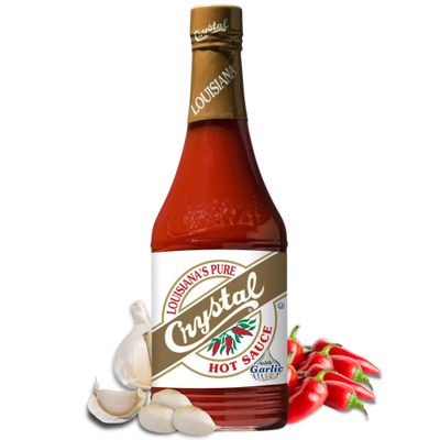 Crystal Louisiana&#39;s Pure Hot Sauce with Garlic, 12 Ounce, Aged Cayenne Peppers, Medium Heat, Flavor Gumbo to Bloody Mary&#39;s
