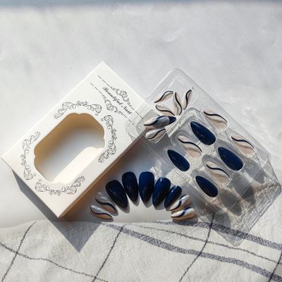 Navy Blue Press on Nails Almond Fake Nails with Designs Glossy Silver False Nails Glitter Artificial Glue on Nails Medium Length Stick on Nails Swirl Nude Nails Press on Acrylic Nails for Women 24 Pcs