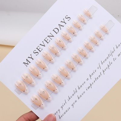 IMRAIN Medium Press on Nails Almond White French Fake Nails Tips Full Cover Glossy Gel Golden Star Glue on False Nails Artificial Nude Stick on Nails for Women Girls 24Pcs