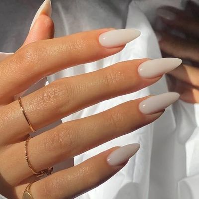 YOSOMMK Cream White Press on Nails Medium Almond Fake Nails Solid Color Glossy Acrylic False Nails Glue on Nails for Women