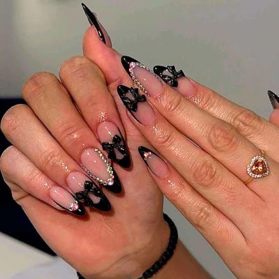 24Pcs Black Bow Press on Nails Medium Almond Fake Nails with Glitter Rhinestones Nails Art Design Nail Tips False Nails Full Cover Artificial Glue on Nails Cute Valentines Stick on Nails for Women DIY