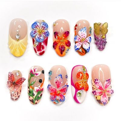 HOSAILY 3D Flower Summer Press on Nails Medium Almond, 24pcs Colorful Butterfly Floral Design Pretty Beach Vacation Nails for Women, Glossy Gold Beads Rhinestones Charms French Tip Glue on False Nails