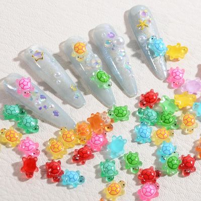 100PCS Resin Sea Turtle Nail Charms - 7 Colors Mixed Cute Mini Tortoise 3D Animal Glow in The Dark Summer Ocean Charms - Rhinestones for Gift DIY Craft Nail Decoration