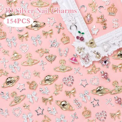 154 Pcs Alloy Star Cross Nail Gems Charms, Silver Gold Bow Crown Butterfly Cross Bow Nail Charms 3D Cherry Planet Heart Nail Jewelry Charms, Nail Rhinestones Gems Charms for Nail Art DIY Decoration