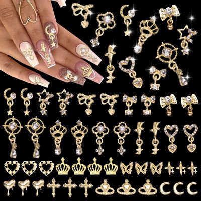 100 Pcs Gold Nail Charms and Gems, Gold Dangle Star Bows Nail Gems Charms, Metal Crown Heart Butterfly Charms for Acrylic Nail Art Alloy Cross Nail Charms for Women DIY Accessories