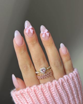 Cute Press on Nails with Bow Charm Designs Cute Pink Fake Nails Medium Almond Shaped Acrylic Nails Gloss False Nails Reusable Glue on Nails for Women Girls